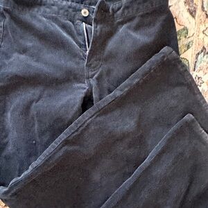 Black corduroy, low rise jeans with slight flare